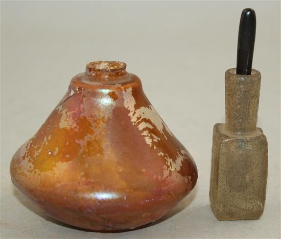 An Islamic glass unguent container, c.600 AD and a Roman glass vessel, 2nd - 4th century AD, 7cm